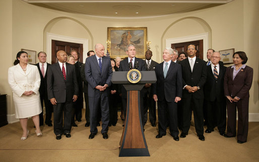 President George W. Bush is flanked by members of his Advisory Council on Financial Literacy Tuesday, Jan. 22, 2008, as he announces its establishment during a statement in the Roosevelt Room of the White House. White House photo by Shealah Craighead