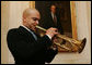 Jazz trumpeter Irvin Mayfield entertains during a reception at the White House, Monday, Jan. 28, 2008, prior to the State of the Union. Mr. Mayfield, a New Orleans native and appointed cultural ambassador for the city, joined Mrs. Laura Bush in the First Lady's Box for the President's address. White House photo by Chris Greenberg