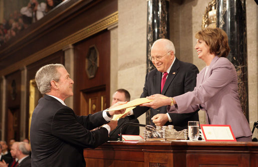 President George W. Bush delivers copies of his speech to Speaker of the House Nancy Pelosi (D-California) and Vice President Dick Cheney before delivering his 2008 State of the Union address Monday, Jan. 28, 2008, at the U.S. Capitol. White House photo by Eric Draper