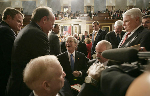 President George W. Bush is surrounded by members of Congress as he prepares to leave the House chamber Monday evening, Jan. 28, 2008 at the U.S. Capitol, following the President's State of the Union Address. White House photo by Eric Draper