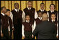 The Richmond Boys Choir, led by Artistic Director Billy Dye, performs during the Coming Up Taller awards ceremony Monday, Jan. 28, 2008, in the East Room of the White House. In thanking the choir afterwards, Mrs. Laura Bush said, "I like that you sang Stevie Wonder's song, "Always," because I think that's what children in each one of these programs that we've represented today will learn in your programs, and that is that somebody will love them always." White House photo by Shealah Craighead