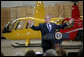 President George W. Bush gestures as he addresses his remarks on the economy and the benefits of free trade, following his tour of the Robinson Helicopter Company Wednesday, Jan. 30, 2008 in Torrance, Calif. White House photo by Eric Draper