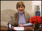 Taking the opportunity to speak about American Heart Month, Mrs. Laura Bush delivers the weekly radio address from her office in the White House. Said Mrs. Bush, "This American Heart Month, all of us can be Heart Truth ambassadors. Start by protecting your own heart, and spread the word to others. February is a month known for Valentines. This February, encourage your loved ones to take care of their health. It's the best Valentine's gift you could possibly give." White House photo by Shealah Craighead
