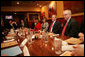 President George W. Bush meets with local business leaders at breakfast Friday, Feb. 1, 2008, in Kansas City, Mo. The President met the group before continuing on to Hallmark Cards, Inc., where he delivered a statement on the economy. White House photo by Eric Draper