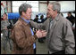 President George W. Bush spends a moment with Shelvy Linville, Mayor of Macon County, Tennessee, after attending a briefing Friday, Feb. 8, 2008, on the regional tornado damage left in the wake of Tuesday's deadly storms. White House photo by Chris Greenberg