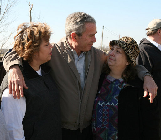 President George W. Bush embraces residents of Lafayette, Tennessee during his visit Friday, Feb. 8, 2008, to the region that was hard hit by Tuesday's tornadoes. White House photo by Chris Greenberg