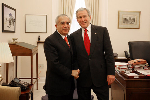 President George W. Bush stands with Dr. Salam Fayyad, Prime Minister of the Palestinian Authority, during his visit Monday, Feb. 11, 2008, to the White House for a meeting with Stephen Hadley, National Security Advisor. White House photo by Joyce N. Boghosian