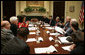 President George W. Bush attends the National Security Advisor's meeting with the Helping to Enhance the Livelihood of People around the Globe (H.E.L.P.) Commission Tuesday, Feb. 12, 2008, in the Roosevelt Room at the White House. The H.E.L.P. Commission reviews foreign assistance and provides recommendations to the President and Congress. White House photo by Joyce N. Boghosian