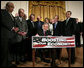 President George W. Bush signs H.R. 5140, the Economic Stimulus Act of 2008, Wednesday, Feb. 13, 2008, in the East Room at the White House. White House photo by David Bohrer