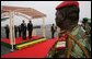 President George W. Bush and President Boni Yayi of Benin, stand for their respective national anthems Saturday, Feb. 16, 2008, after the President and Mrs. Laura Bush arrived at Cadjehoun International Airport in Cotonou, Benin, the first of five stops in Africa. White House photo by Chris Greenberg
