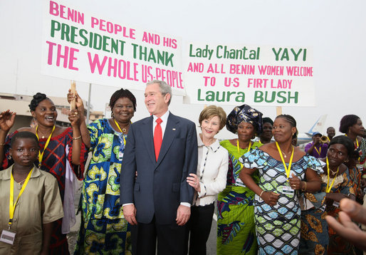 President George W. Bush and Mrs. Laura Bush pose with women at Cadjehoun International Airport in Cotonou, Benin Saturday, Feb. 16, 2008, after they greeted the President and First Lady upon arrival. White House photo by Shealah Craighead