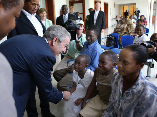 President George W. Bush meets patients and their families Sunday, Feb. 17, 2008, in the reception room of the Amana District Hospital in Dar es Salaam, Tanzania, where President Bush and Mrs. Bush visited a patients and staff at the hospital's care and treament clinic. White House photo by Eric Draper