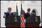 President George W. Bush delivers remarks as he participates in a joint press availability Sunday, Feb. 17, 2008, with President Jakaya Kikwete of Tanzania at the State House in Dar es Salaam. White House photo by Eric Draper