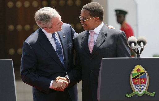 President George W. Bush and President Jakaya Kilwete of Tanzania shake hands following their joint press availability Sunday, Feb. 17, 2008, at the State House in Dar es Salaam, Tanzania. White House photo by Chris Greenberg