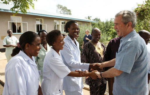 President George W. Bush greets and thanks the staff of the Meru District Hospital Monday, Feb. 18, 2008, for their work at the hospital's outpatient clinic in Arusha, Tanzania. White House photo by Eric Draper