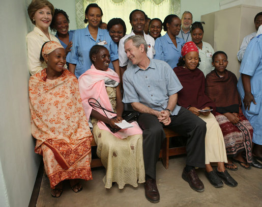 President George W. Bush and Mrs. Laura Bush pose for a photo Monday, Feb. 18, 2008, with patients and staff at the Meru District Hospital outpatient clinic in Arusha, Tanzania. White House photo by Eric Draper