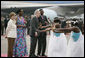 President George W. Bush and Mrs. Laura Bush are welcomed Tuesday, Feb. 19, 2008 by Rwanda President Paul Kagame and his wife, Jeannette Kagame, on their arrival to Kigali International Airport in Kigali, Rwanda. White House photo by Shealah Craighead