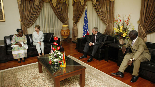 President George W. Bush and Mrs. Laura Bush visit with Ghana President John Agyekum Kufuor and first lady Theresa Kufuor, upon their arrival Tuesday, Feb. 19, 2008, to Kotoka International Airport in Accra, Ghana. White House photo by Eric Draper