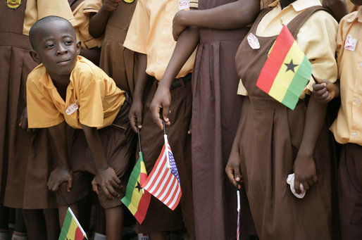 A young student at the Mallam D/A Primary School in Accra, Ghana, watches for the arrival of Mrs. Laura Bush and Ghana first lady Theresa Kufuor, Wednesday, Feb. 20, 2008 in Accra, Ghana. White House photo by Shealah Craighead