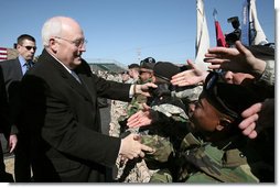 Vice President Dick Cheney shakes the outstretched hands of soldiers Tuesday, Feb. 26, 2008, following a rally for the troops at Fort Hood, Texas, home of the U.S. Army's First Cavalry Division. White House photo by David Bohrer