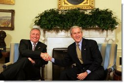 President George W. Bush shakes hands with Prime Minister of the Czech Republic, Mirek Topolanek, during their meeting Wednesday, Feb. 27, 2008, in the Oval Office. White House photo by Joyce N. Boghosian
