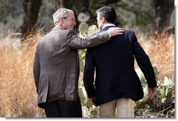 President George W. Bush and Prime Minister Anders Fogh Rasmussen of Denmark walk together at the conclusion of their press availability at The Bush Ranch in Crawford, Texas, Saturday, March 1, 2008, in Crawford, Texas. White House photo by Eric Draper