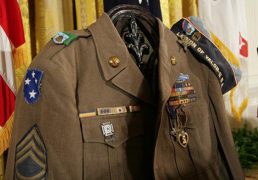 The Korean era U.S. Army jacket of Master Sgt. Woodrow Wilson Keeble is seen Monday, March 3, 2008, displayed in the East Room of the White House, during the presentation of the Medal of Honor, posthumously, in honor of Master Sgt. Keeble’s gallantry during his service in the Korean War. Keeble is the first full-blooded Sioux Indian to receive the Medal of Honor. White House photo by Eric Draper