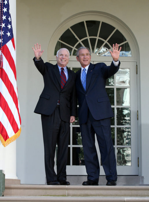President George W. Bush and Senator John McCain (R-Ariz.) wave after delivering a statement Wednesday, March 5, 2008, in the Rose Garden of the White House. In welcoming Senator McCain and his wife, Cindy, the President said, "A while back I don't think many people would have thought that John McCain would be here as the nominee of the Republican Party -- except he knew he would be here, and so did his wife, Cindy." White House photo by Joyce N. Boghosian