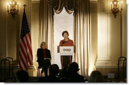 Mrs. Laura Bush speaks at the 2008 Annual Meeting of the Association of American Publishers Wednesday, March 5, 2008, at the Yale Club in New York City. Looking on is Patricia Schroeder, President and Chief Executive Officer of the group. White House photo by Shealah Craighead