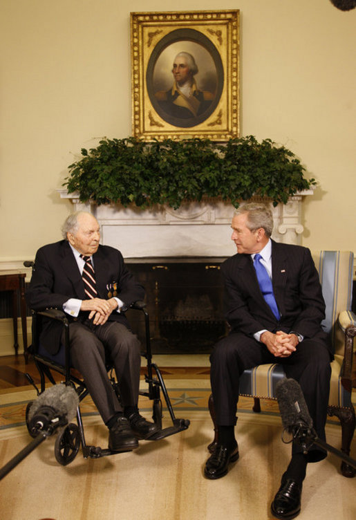 President George W. Bush welcomes Cpl. Frank Woodruff Buckles, the last known surviving American-born WWI veteran, to the Oval Office Thursday, March 6, 2008. The President told the 107-year-old, ".One way for me to honor the service of those who wear the uniform in the past and those who wear it today is to herald you, sir, and to thank you very much for your patriotism and your love for America." White House photo by Eric Draper