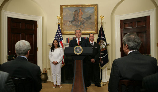 President George W. Bush is joined by Cuban political activists Miguel Sigler Amaya and his wife, Josefa Lopez Pena as he delivers a statement Friday, March 7, 2008, on the state of Cuba. Said the President, "As I told the Cuban people last October, a new day for Cuba will come. Until that day comes, the United States will continue to shine a bright and revealing light on Cuba's abuses. We will continue to tell the stories of Cuba's people, even when a lot of the world doesn't want to hear them. And we will carry this refrain in our hearts: Viva Cuba Libre." White House photo by Chris Greenberg