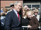 President George W. Bush poses for photos on his departure Tuesday, March 11, 2008 from Nashville, Tenn., following his address to the National Religious Broadcasters convention. White House photo by Chris Greenberg
