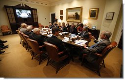 President George W. Bush participates in a video teleconference with Afghanistan Provincial Reconstruction Team Leaders and Brigade Combat Commanders Thursday, March 13, 2008, in the Roosevelt Room of the White House. White House photo by Eric Draper