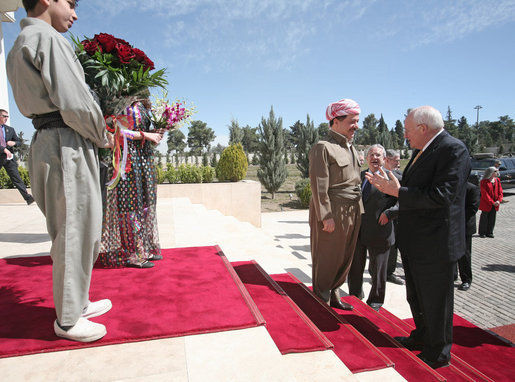Vice President Dick Cheney is greeted by Kurdish Regional Government President Massoud Barzani Tuesday, March 18, 2008 upon arrival to the president's residence in Irbil, Iraq. The Vice President's visit to Irbil comes on the second day of an unannounced trip to Iraq where he has met with Iraqi leadership, U.S. officials and U.S. troops. White House photo by David Bohrer