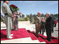Vice President Dick Cheney is greeted by Kurdish Regional Government President Massoud Barzani Tuesday, March 18, 2008 upon arrival to the president's residence in Irbil, Iraq. The Vice President's visit to Irbil comes on the second day of an unannounced trip to Iraq where he has met with Iraqi leadership, U.S. officials and U.S. troops. White House photo by David Bohrer