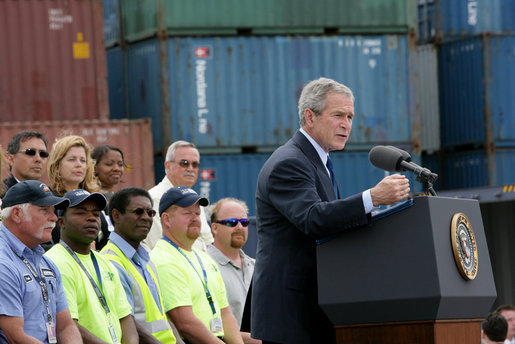 President George W. Bush, joined on stage by port workers, delivers remarks on U.S. trade policy Tuesday, March 18, 2008, at the Blount Island Marine Terminal in Jacksonville, Fla. White House photo by Chris Greenberg