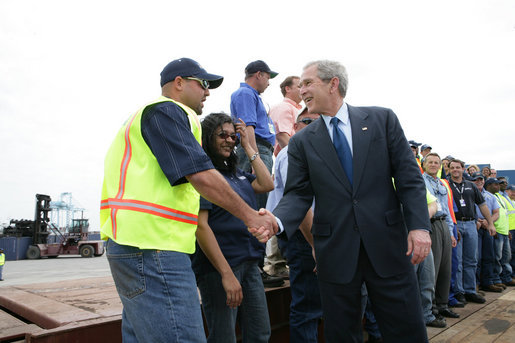 President George W. Bush meets and speaks with port workers following his remarks on U.S. trade policy Tuesday, March 18, 2008, at the Blount Island Marine Terminal in Jacksonville, Fla. White House photo by Chris Greenberg