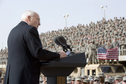 Vice President Dick Cheney delivers remarks Tuesday, March 18, 2008 to U.S. troops during a rally at Balad Air Base, Iraq. "During this deployment, ladies and gentlemen, you've seen incredible progress on the ground in Iraq -- not just as witnesses, but as participants," said the Vice President, adding, "The President and I, and your fellow citizens, want nothing more than have you and all of your comrades return home safely at the end of this tour of duty. We're going to do everything we can to make that happen." White House photo by David Bohrer