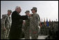 Vice President Dick Cheney awards PFC Veronica Alfaro with the Bronze Star Tuesday, March 18, 2008, during a rally for U.S. troops at Balad Air Base, Iraq. "I can't describe the feeling I had when he awarded me the Bronze Star," said Alfaro, 2nd Platoon senior medic, Bravo Company. "It is definitely a moment I will always remember and cherish; I will never forget it." White House photo by David Bohrer
