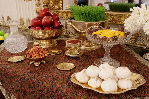 A traditional Haft Sin table celebrating Nowruz, the Persian New Year, is seen set Wednesday, March 19, 2008, in the State Dining Room of the White House. Nowruz is, in Persian and some other cultures, including Kurdish culture, a family-oriented holiday celebrating the New Year and the coming of spring. The Haft Sin table has seven items symbolizing new life, joy, love, beauty and health, sunrise, patience and garlic to ward off evil. White House photo by Chris Greenberg