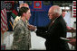 Vice President Dick Cheney awards the Silver Star Medal to Army Specialist Monica Brown of Lake Jackson, Texas Thursday, March 20, 2008, following a dinner with U.S. troops at Bagram Air Base, Afghanistan. While serving as a combat medic in April of 2007, Spc. Brown, 19, showed extraordinary heroism when she used her body to shield wounded soldiers from enemy gunfire and mortar shelling, then moving them to safety after their convoy came under attack in Afghanistan’s eastern Paktia province. She is the second woman since World War II to receive the Silver Star. White House photo by David Bohrer