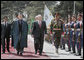 Vice President Dick Cheney, accompanied by President Hamid Karzai of Afghanistan, reviews an honor guard upon his arrival to Kabul Thursday, March 20, 2008. The Vice President's visit to Afghanistan is the third stop on a 10-day trip to the Middle East and Turkey. White House photo by David Bohrer
