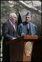With President Hamid Karzai of Afghanistan looking on, Vice President Dick Cheney delivers a statement to the press Thursday, March 20, 2008 on the grounds of Gul Khana Palace in Kabul. "During the last six years, the people of Afghanistan have made a bold and confident journey, throwing off the burden of tyranny, winning your freedom and reclaiming your future," said the Vice President, adding, "The United States of America has proudly walked with you on this journey, and we walk with you still." White House photo by David Bohrer