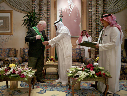 Vice President Dick Cheney is awarded the Abdul Aziz Sash by Saudi Arabia's King Abdullah during a meeting Friday, March 21, 2008 at the king's Al Janadriyah farm outside of Riyadh. White House photo by David Bohrer
