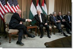Vice President Dick Cheney and President Mahmoud Abbas of the Palestinian Authority shake hands Sunday, March 23, 2008, during their meeting at the Muqata in Ramallah. White House photo by David Bohrer
