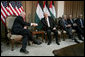 Vice President Dick Cheney and President Mahmoud Abbas of the Palestinian Authority shake hands Sunday, March 23, 2008, during their meeting at the Muqata in Ramallah. White House photo by David Bohrer