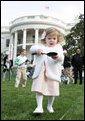 A young child carefully balances her Easter Egg on a spoon Monday, March 24, 2008 on the South Lawn of the White House, during the 2008 White House Easter Egg Roll. White House photo by Joyce N. Boghosian