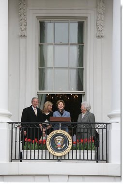 Mrs. Laura Bush, joined by President George W. Bush, daughter, Jenna, and former first lady Barbara Bush, welcomes guests Monday, March 24, 2008 to the South Lawn of the White House, for the 2008 White House Easter Egg Roll.  White House photo by Joyce N. Boghosian