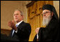 President George W. Bush is joined by Archbishop Demetrios as he delivers his remarks at the Celebration of Greek Independence Day Tuesday, March 25, 2008, in the East Room of the White House. White House photo by Joyce N. Boghosian