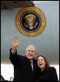 President George W. Bush waves to the family members and friends of Lydia Humenycky, a USA Freedom Corps Service recognition recipient honored by President Bush for her volunteer service, Thursday, March 27, 2008, on arrival at the Pittsburgh International Airport. White House photo by Eric Draper